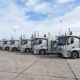 group trucks parked line truck stop 80x80
